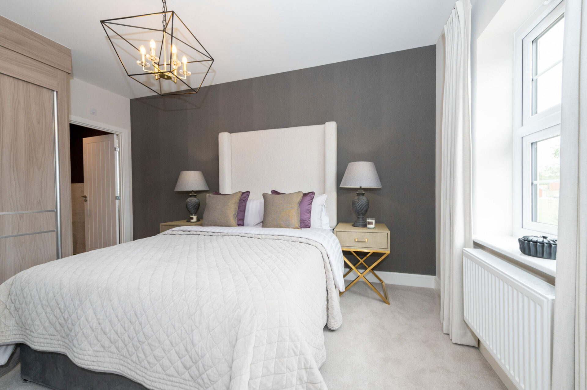 Spacious double bedroom with fitted wardrobe and ensuite shower room
